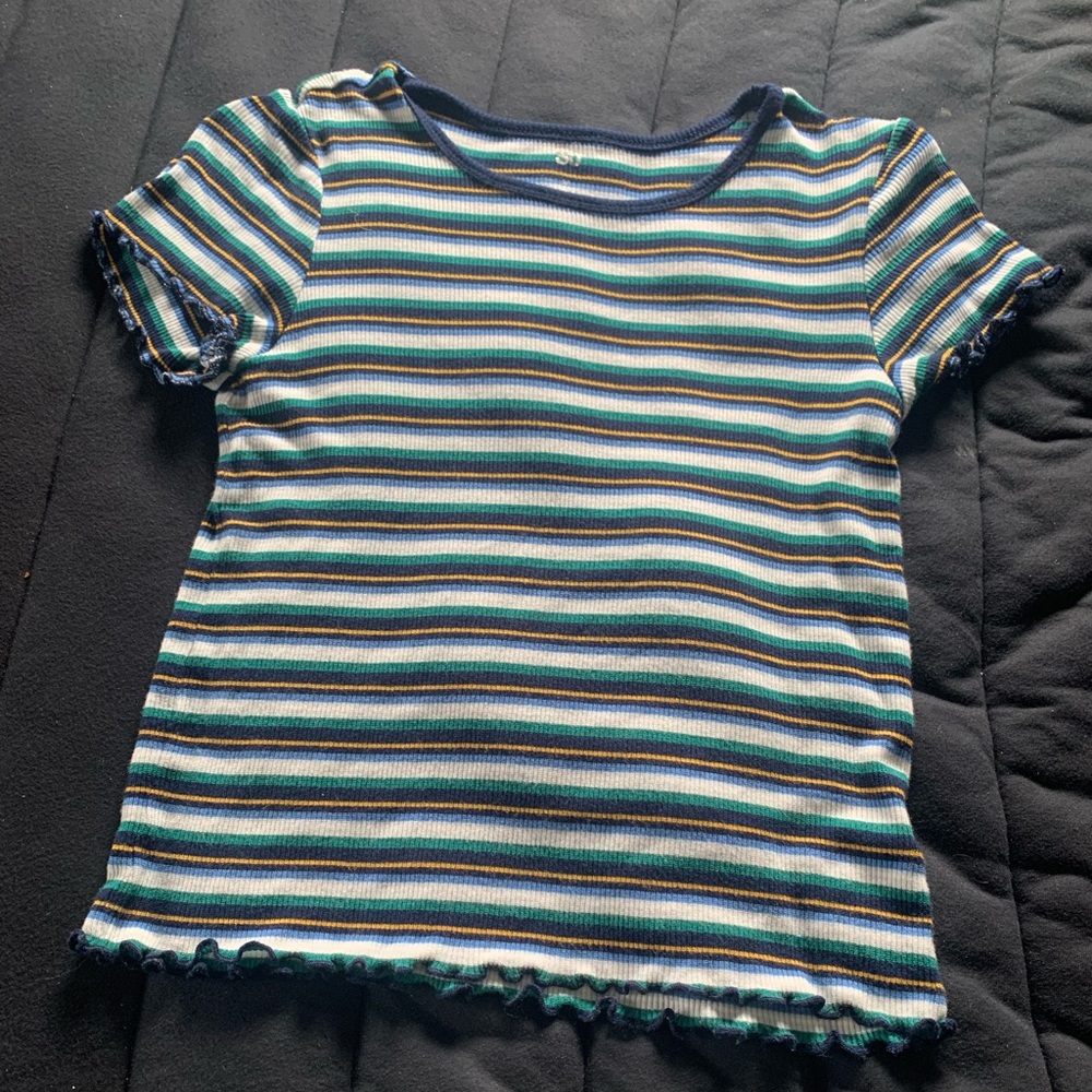 Striped shirt with ruffled sleeves and buttom